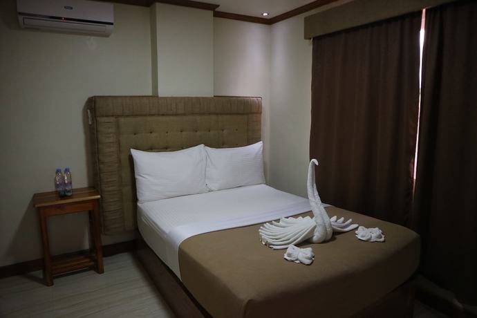 Imagen de la habitación del Hotel Candice Lucy. Foto 17
