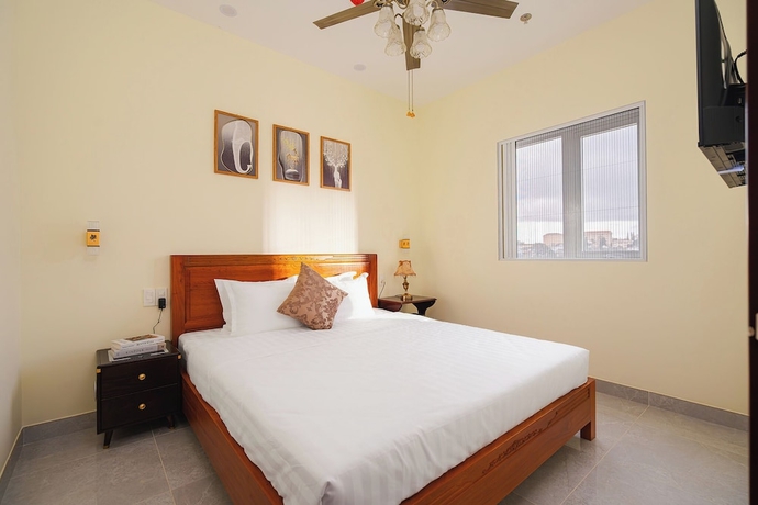 Imagen de la habitación del Hotel CandlePine Suites. Foto 8