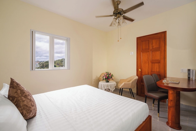 Imagen de la habitación del Hotel CandlePine Suites. Foto 11