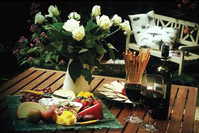 Imagen de la habitación del Hotel Candlelight Cottages. Foto 6