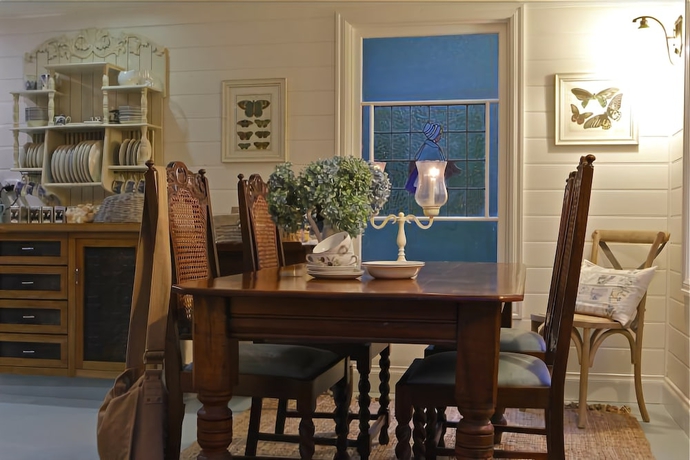 Imagen del bar/restaurante del Hotel Candlelight Cottages. Foto 3