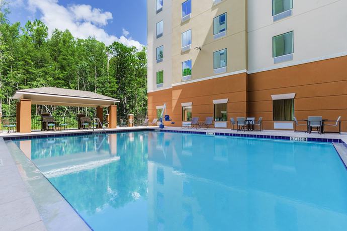 Imagen de la piscina del Hotel Candlewood Suites Orlando - Lake Buena Vista, an IHG. Foto 19