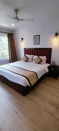 Imagen de la habitación del Hotel Candolim Suites. Foto 18