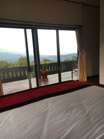 Imagen de la habitación del Hotel Candra Cottage. Foto 27