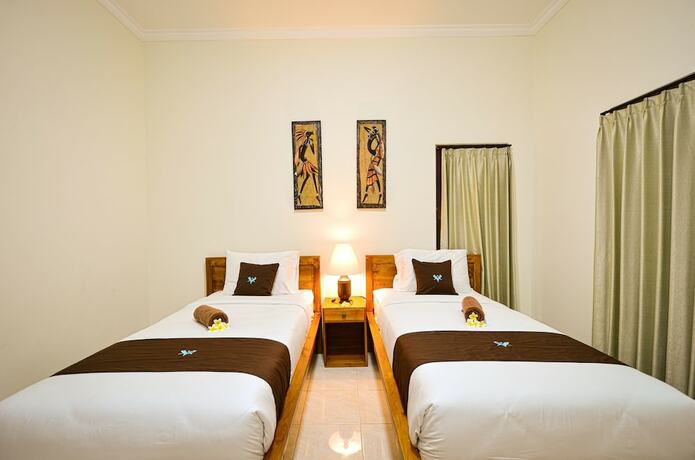 Imagen de la habitación del Hotel Canggu Kayuma House, Canggu. Foto 5