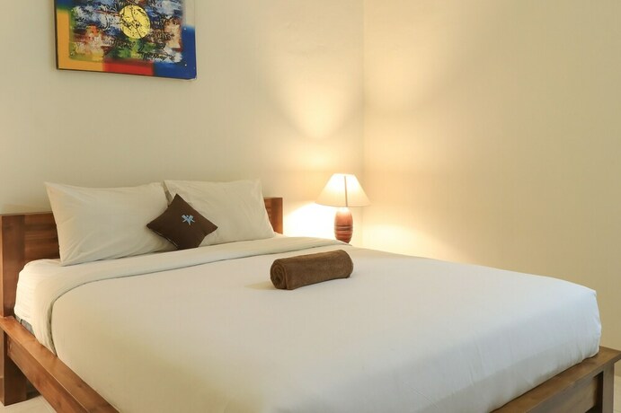 Imagen de la habitación del Hotel Canggu Kayuma House, Canggu. Foto 6