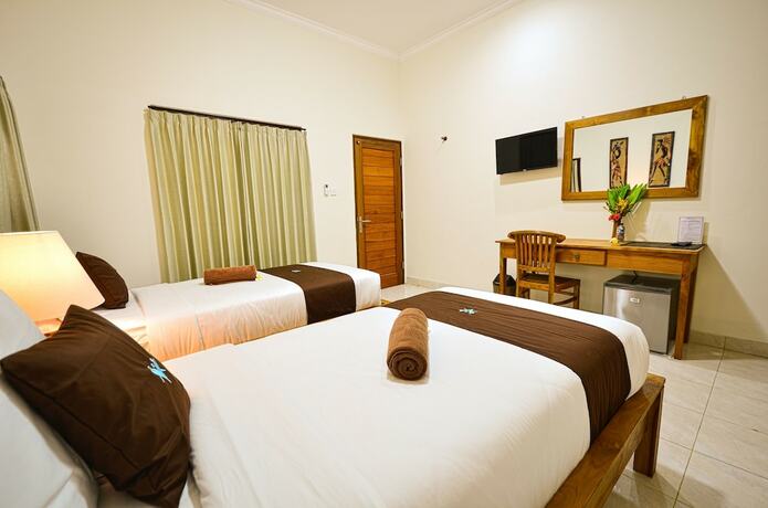 Imagen de la habitación del Hotel Canggu Kayuma House, Canggu. Foto 9