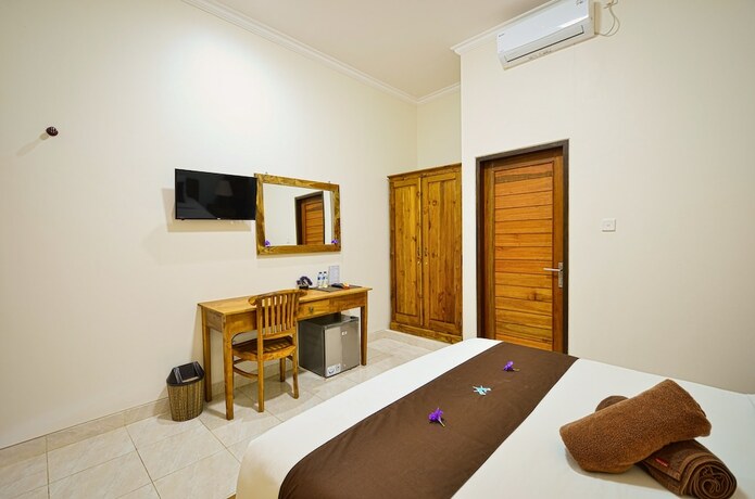Imagen de la habitación del Hotel Canggu Kayuma House, Canggu. Foto 18