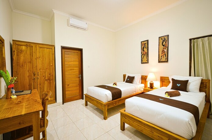 Imagen de la habitación del Hotel Canggu Kayuma House, Canggu. Foto 19