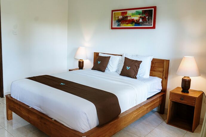 Imagen de la habitación del Hotel Canggu Kayuma House, Canggu. Foto 18