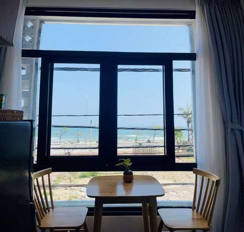 Imagen de la habitación del Hotel Cani Beach House. Foto 16