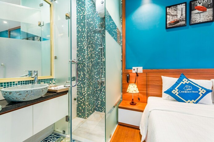 Imagen de la habitación del Hotel Cani Beach House. Foto 18