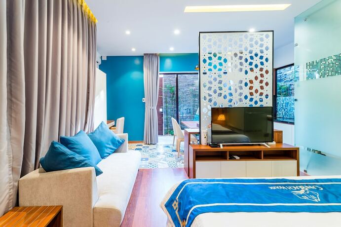 Imagen de la habitación del Hotel Cani Beach House. Foto 22