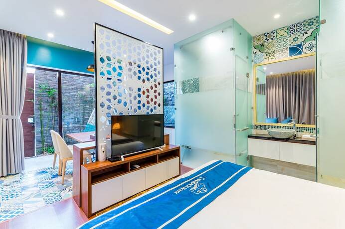 Imagen de la habitación del Hotel Cani Beach House. Foto 31