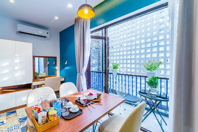 Imagen de la habitación del Hotel Cani Beach House. Foto 32
