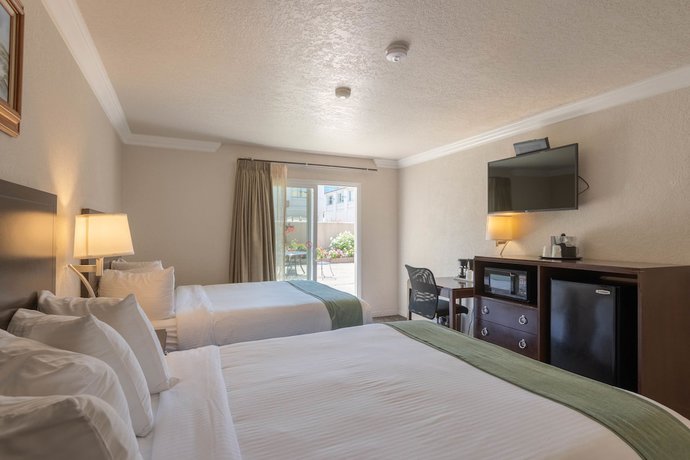 Imagen de la habitación del Hotel Cannery Row Inn. Foto 17