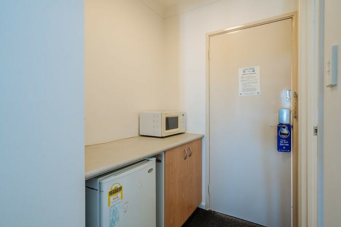 Imagen de la habitación del Hotel Canning Bridge Auto Lodge. Foto 18