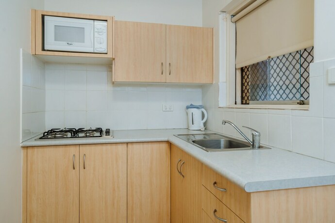 Imagen de la habitación del Hotel Canning Bridge Auto Lodge. Foto 20