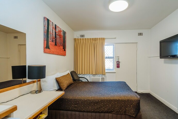 Imagen de la habitación del Hotel Canning Bridge Auto Lodge. Foto 21