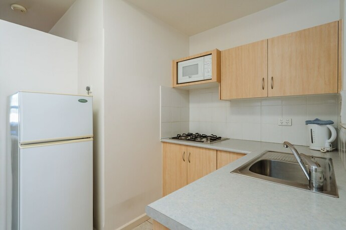 Imagen de la habitación del Hotel Canning Bridge Auto Lodge. Foto 28