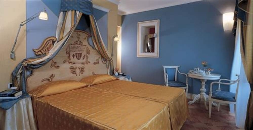 Imagen de la habitación del Hotel Cannobio. Foto 8