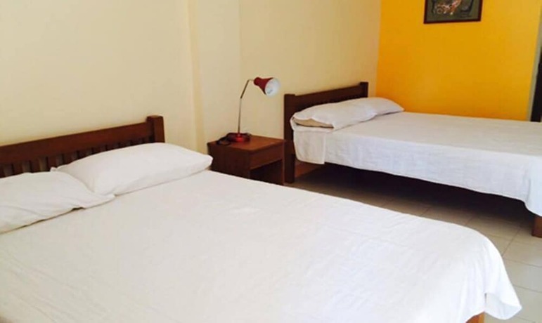 Imagen de la habitación del Hotel Canoe Beach Resort. Foto 15