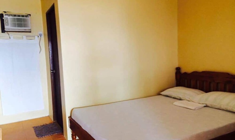 Imagen de la habitación del Hotel Canoe Beach Resort. Foto 16