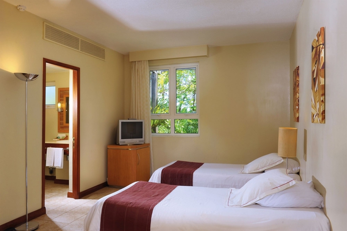 Imagen de la habitación del Hotel Canonnier Beachcomber Golf Resort and Spa. Foto 7