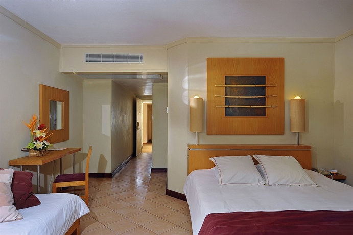 Imagen de la habitación del Hotel Canonnier Beachcomber Golf Resort and Spa. Foto 9