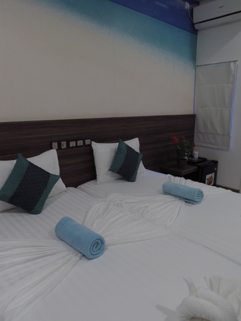 Imagen de la habitación del Hotel Canopus Retreat Thulusdhoo. Foto 14