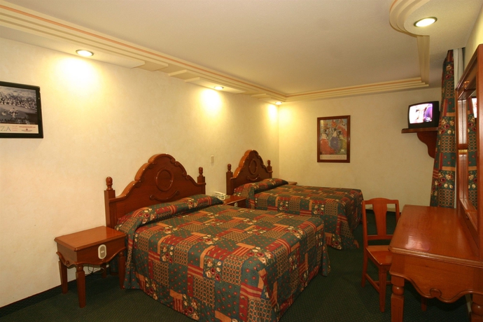 Imagen de la habitación del Hotel Cantera Real. Foto 5