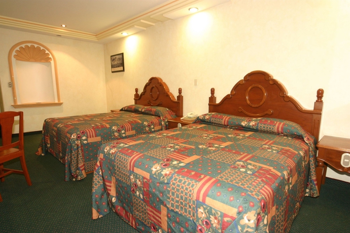 Imagen de la habitación del Hotel Cantera Real. Foto 9