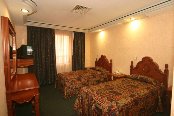 Imagen de la habitación del Hotel Cantera Real. Foto 12