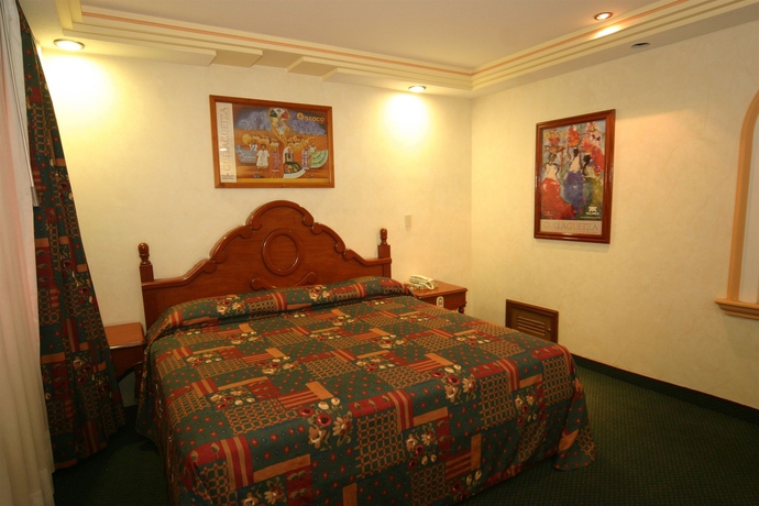 Imagen de la habitación del Hotel Cantera Real. Foto 14