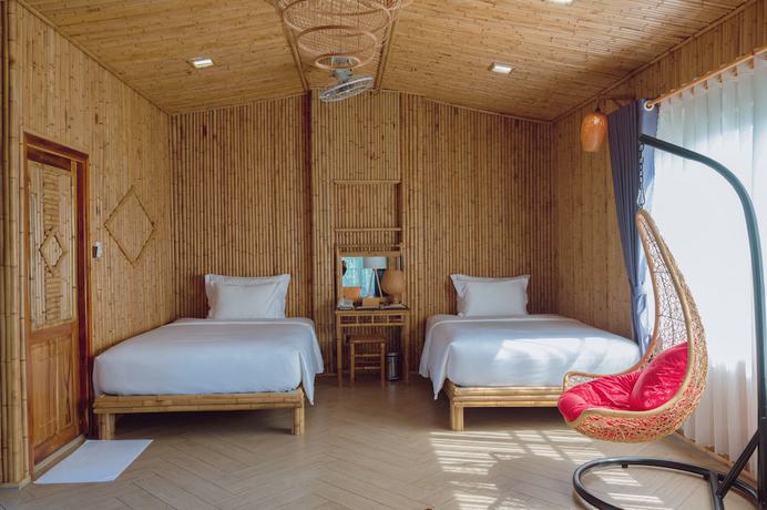 Imagen de la habitación del Hotel Cantho Eco Resort. Foto 3