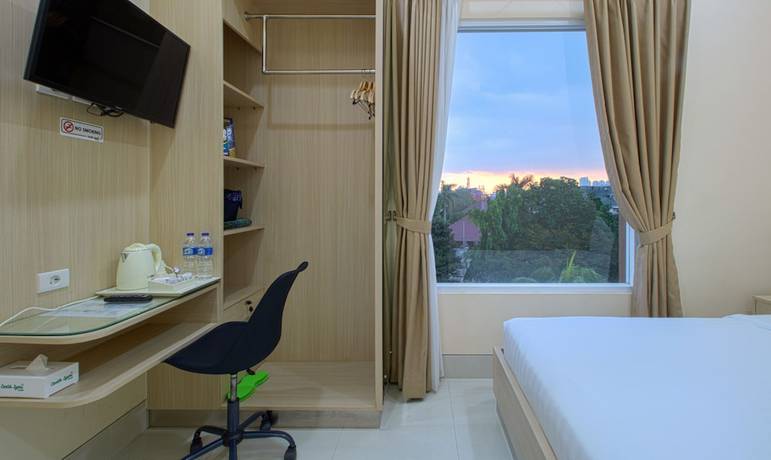 Imagen de la habitación del Hotel Cantik Syari. Foto 2