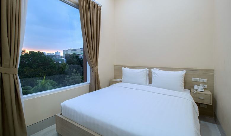 Imagen de la habitación del Hotel Cantik Syari. Foto 4