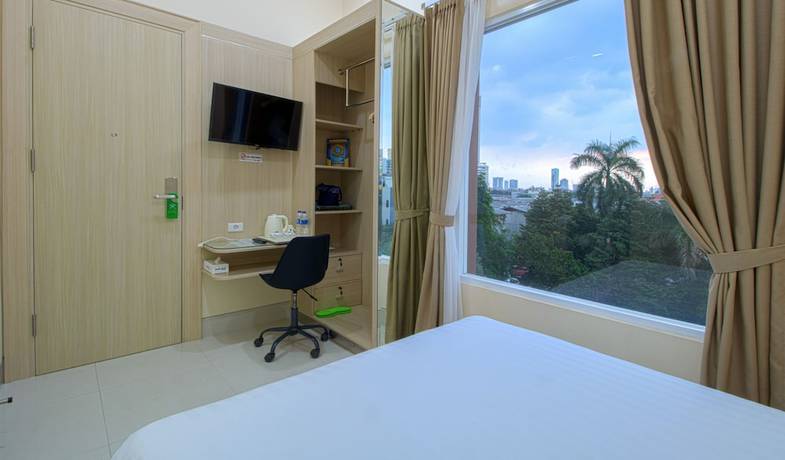 Imagen de la habitación del Hotel Cantik Syari. Foto 6