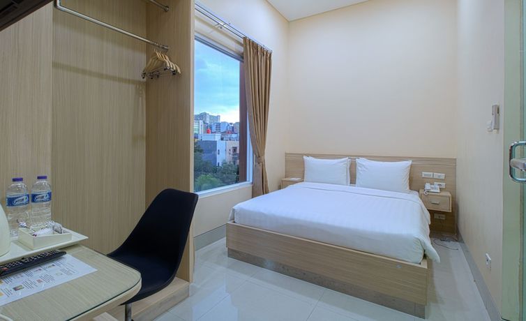 Imagen de la habitación del Hotel Cantik Syari. Foto 8
