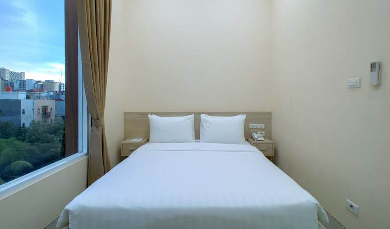 Imagen de la habitación del Hotel Cantik Syari. Foto 9