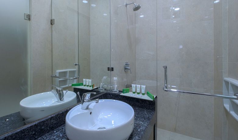Imagen de la habitación del Hotel Cantik Syari. Foto 12
