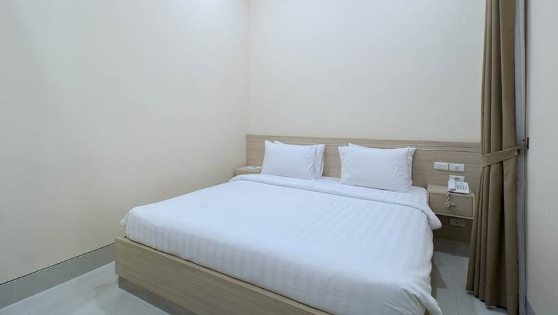 Imagen de la habitación del Hotel Cantik Syari. Foto 13