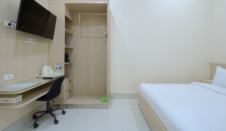 Imagen de la habitación del Hotel Cantik Syari. Foto 14