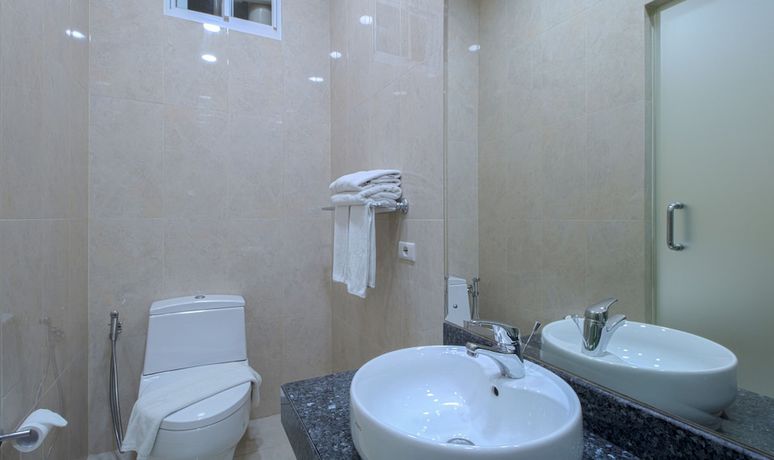 Imagen de la habitación del Hotel Cantik Syari. Foto 15