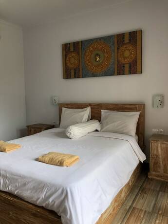 Imagen de la habitación del Hotel Cantika Guest House. Foto 22