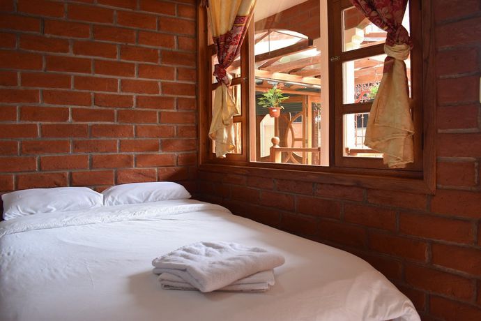 Imagen de la habitación del Hotel Ca&ntilde;averal, Ba&ntilde;os de Agua Santa. Foto 10