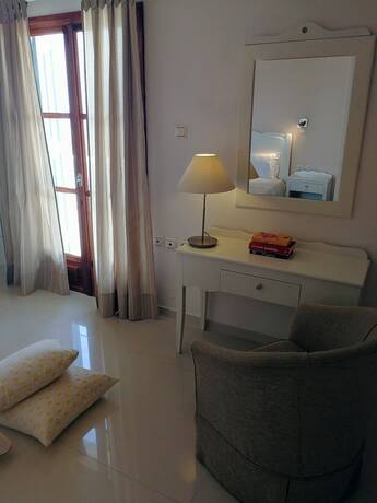 Imagen de la habitación del Hotel Capari Suites. Foto 17