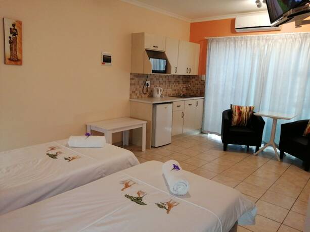 Imagen de la habitación del Hotel Capbon Guesthouse. Foto 15
