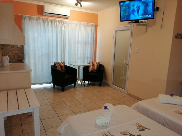Imagen de la habitación del Hotel Capbon Guesthouse. Foto 16