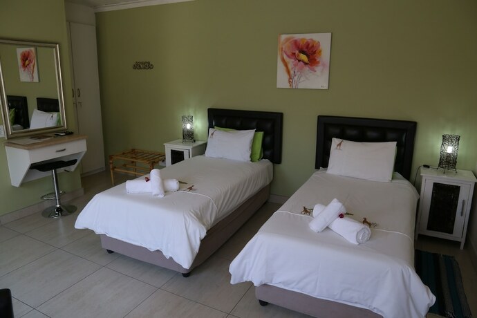Imagen de la habitación del Hotel Capbon Guesthouse. Foto 17